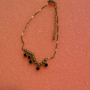 Elegant Gold and Dark Green Bracelet